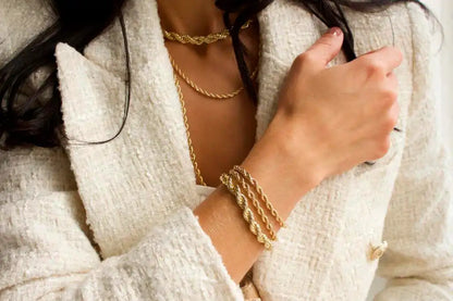 4mm rope chain bracelet for men and women styled with matching necklace, featuring 18K gold plating for a luxurious layered look.